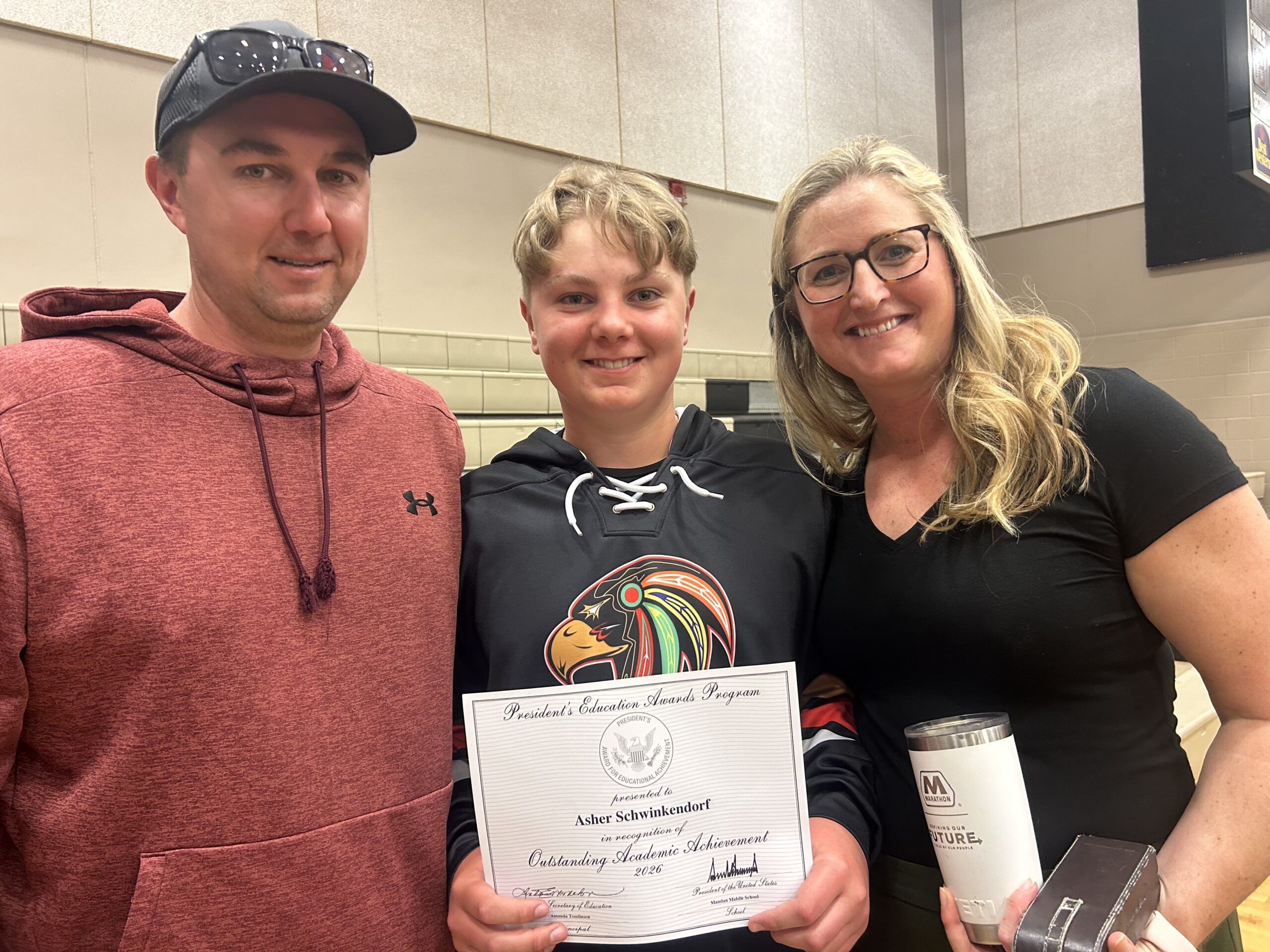 Asher Schwinkendorf with parents